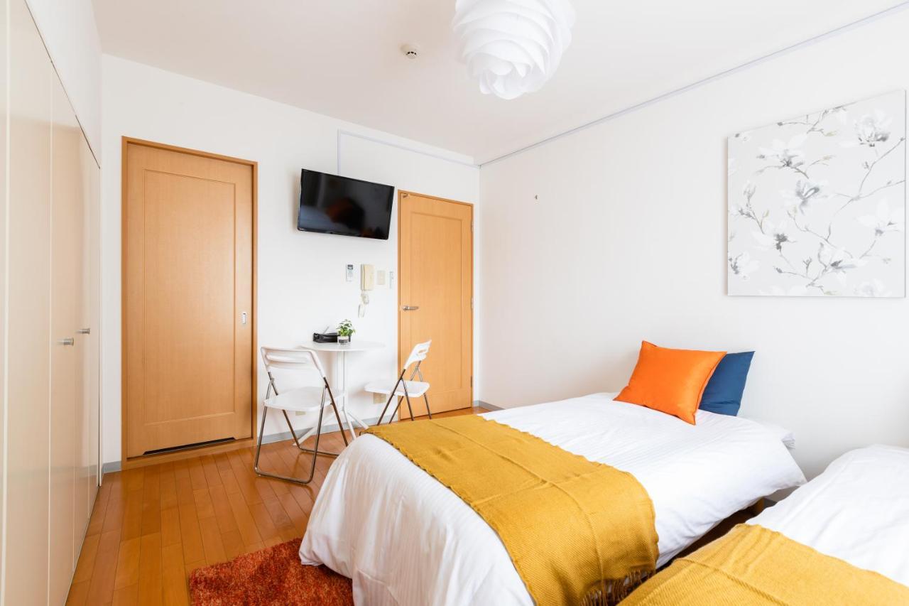 Chambre Lits Jumeaux avec Salle de Bains Privative