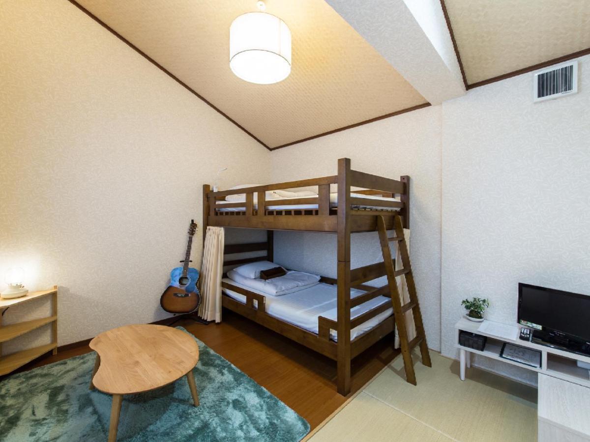Chambre Triple Économique avec Salle de Bains Commune
