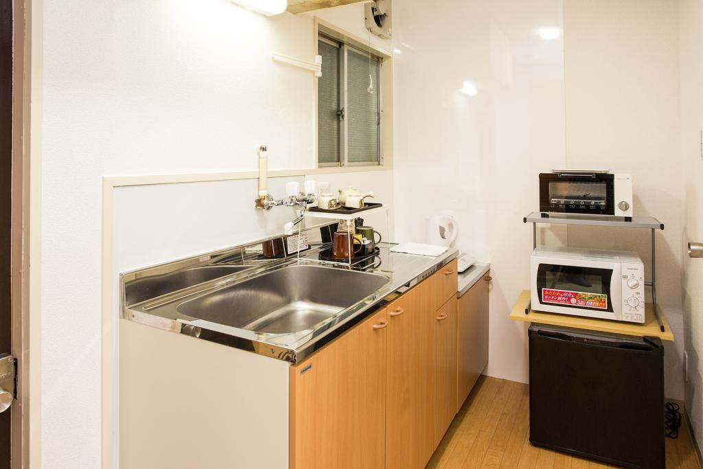 Chambre Lits Jumeaux avec Salle de Bains Privative